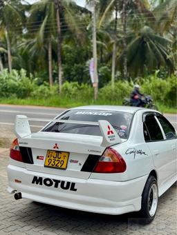 Mitsubishi Lancer 1999 - Photo 7